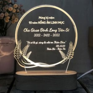đèn led kỷ niệm chương đế gỗ teak sử dụng pin hoặc điện khắc laser logo và nội dung theo yêu cầu: mẫu hoa lúa