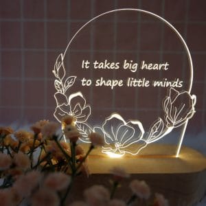 đèn led kỷ niệm chương đế gỗ teak sử dụng pin hoặc điện khắc laser logo và nội dung theo yêu cầu: mẫu hoa tròn